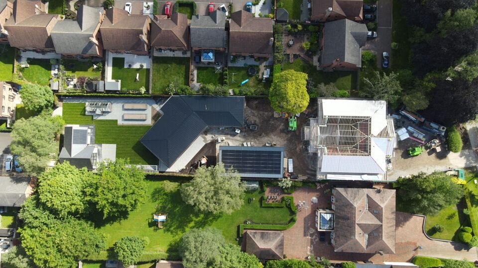 Aerial image of new house with swimming pool and annex